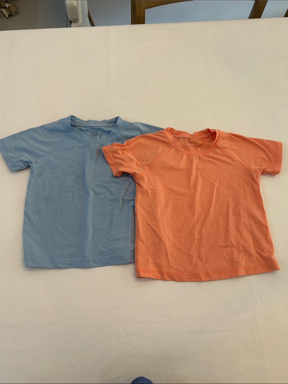 Falls Creek Short Sleeve Tees in Light Blue and Coral Orange